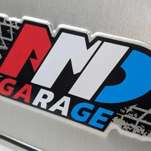 AMD Garage Red White and Blue Embossed License Plate Tag - Image 4 of 4